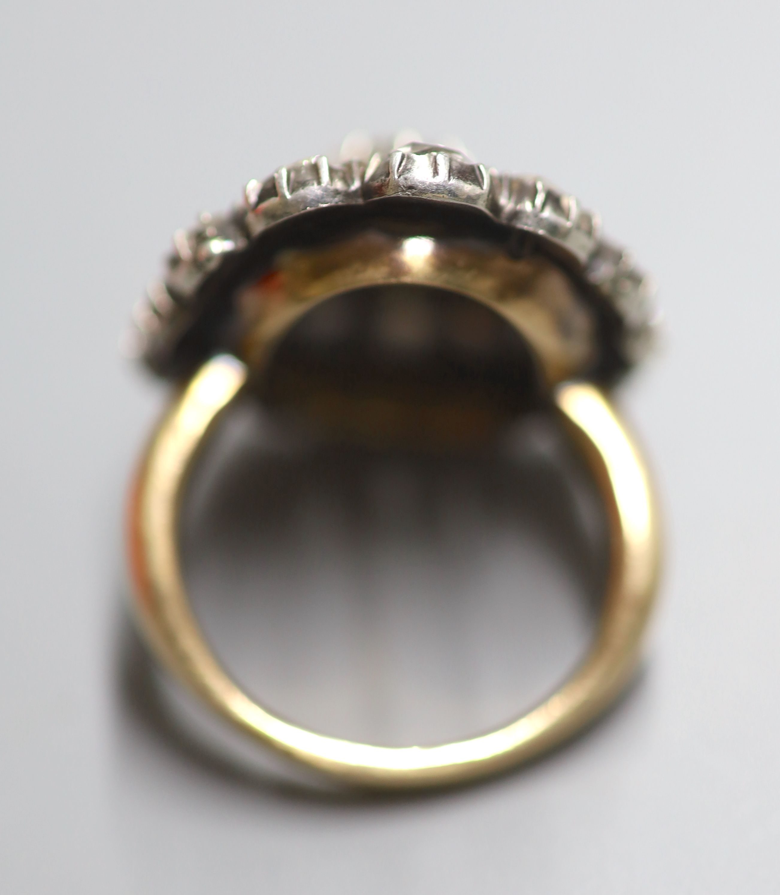 An antique yellow and white metal, rose cut diamond set dress ring, size P/Q, gross 15.6 grams.